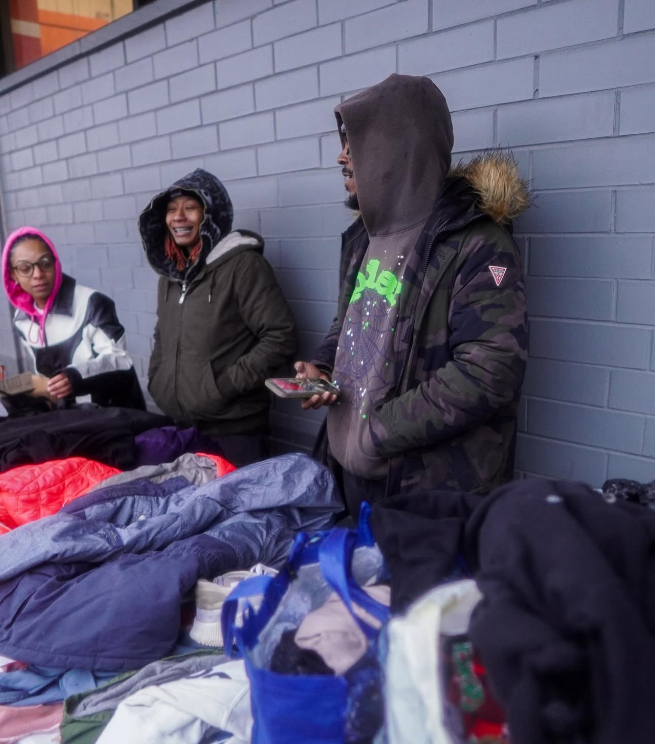 Team distributing clothing at a Hot Spot event
